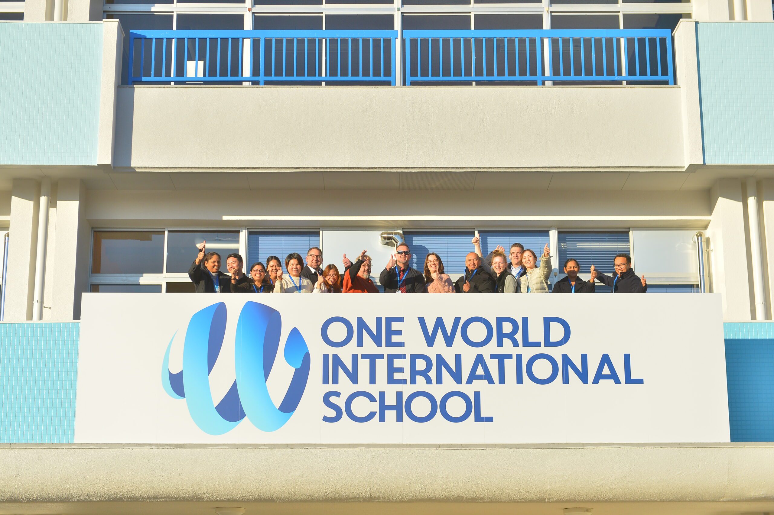 One World International School Tsukuba front facade with staff and faculty